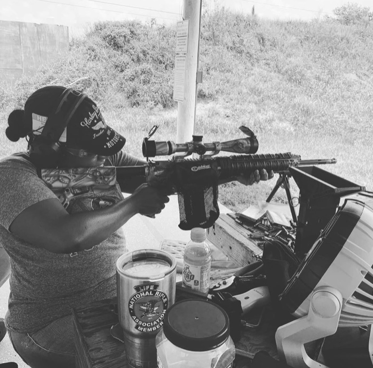 Female shooter rifle training at USS Academy