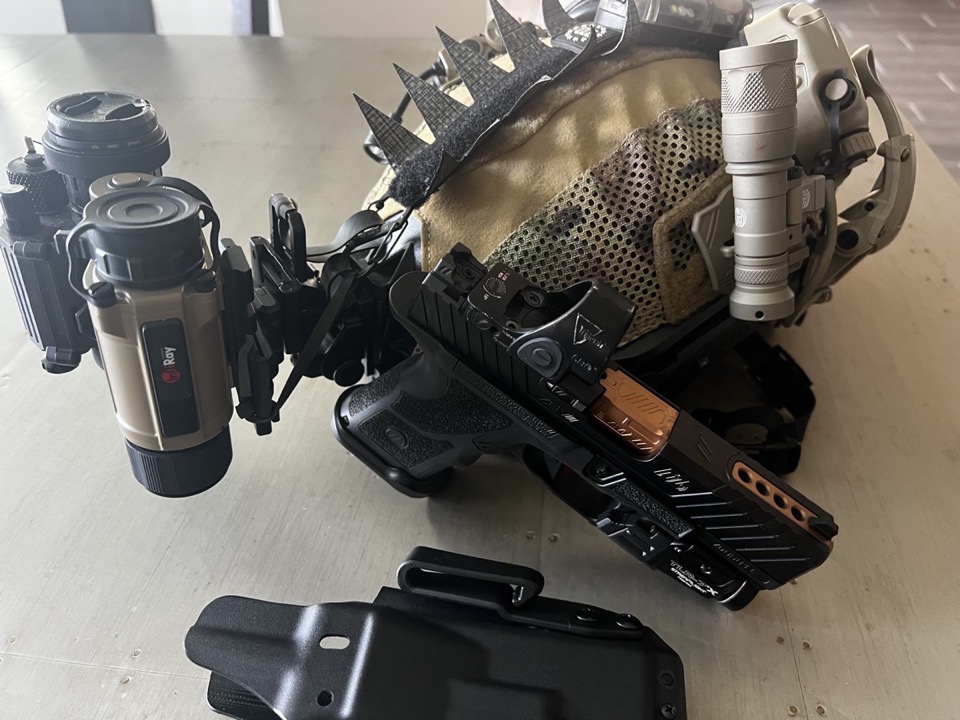 Glock with NVG helmet and red dot setup