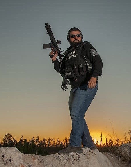 Tactical operator silhouette at sunset