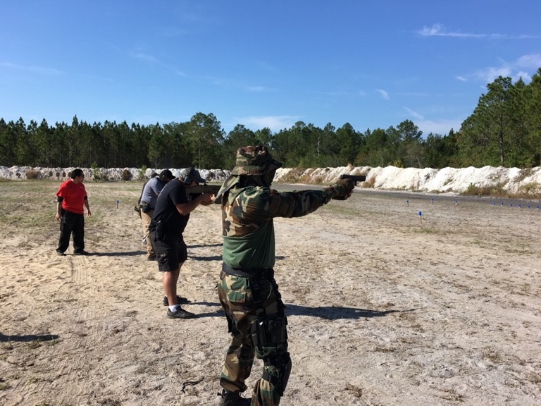 Outdoor range pistol marksmanship training